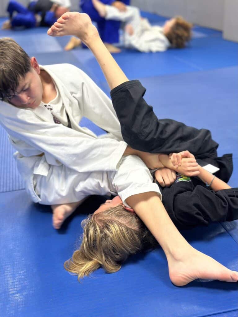 Teens jiu-jitsu class drilling at WDC BJJ Takoma Park